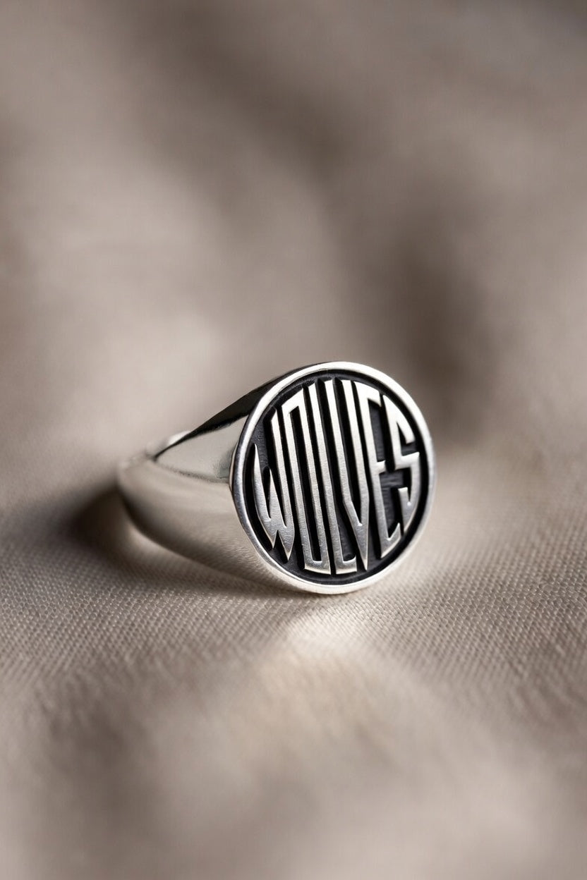 WOLVES signet ring in gold, platinum, matte black